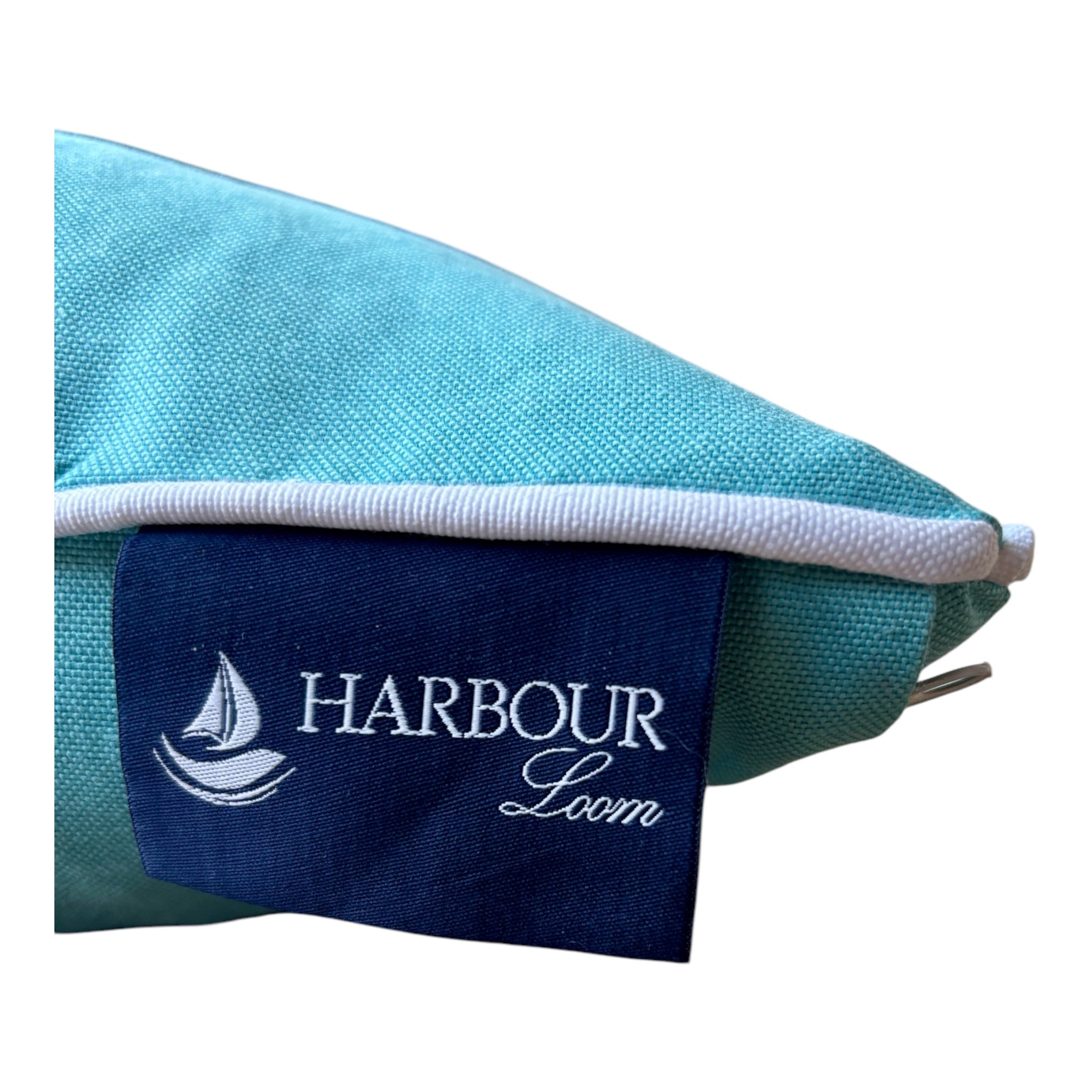 Aqua Dance decorative pillow in turquoise, measuring 14 x 20 inches (35 x 50 cm), designed for life at sea. Made from durable linen with a tailored finish, it combines refined style with practical function aboard boats and sailboats. The serene turquoise tone reflects the colors of open water, bringing a sense of calm and cohesion to nautical interiors.